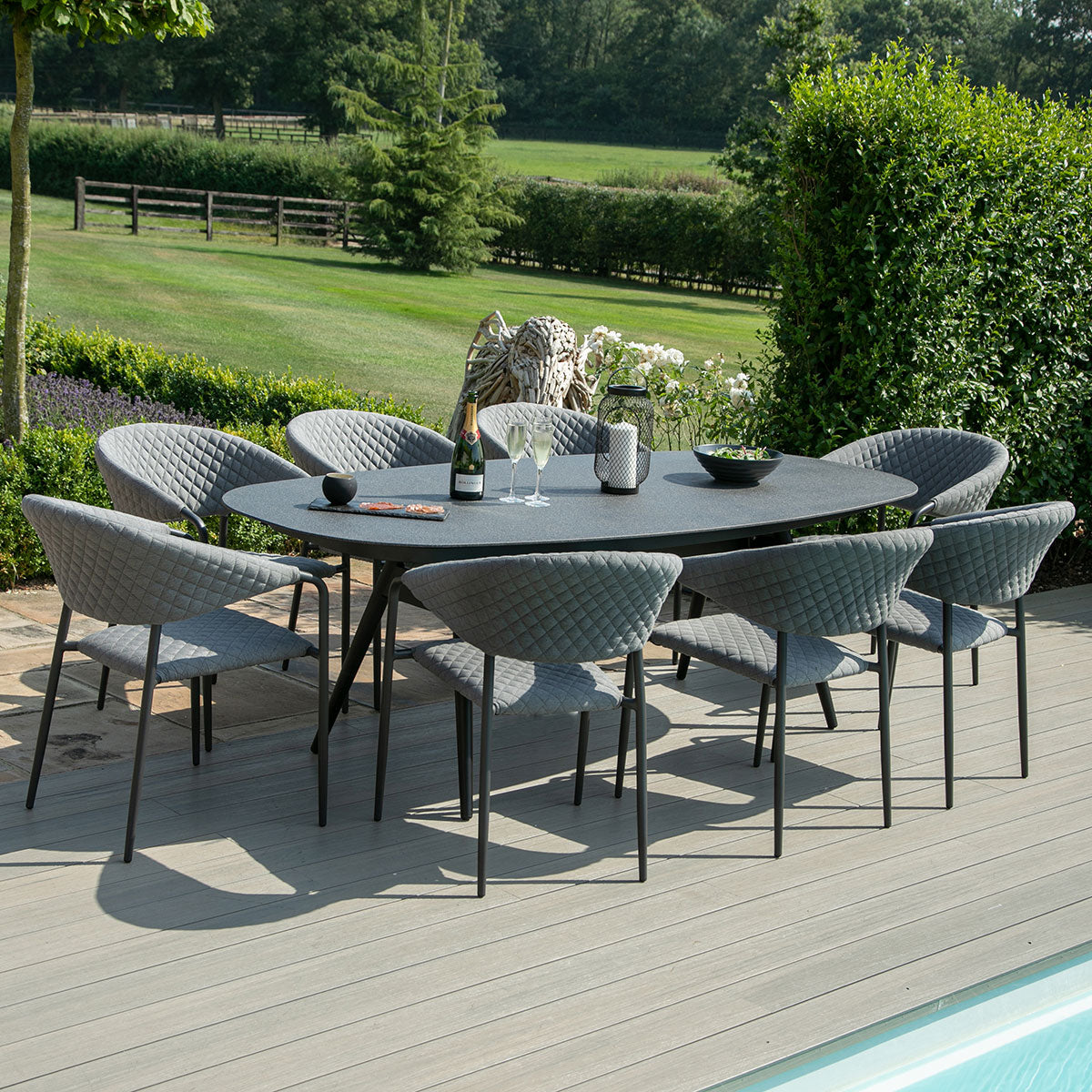 Pebble 8 Seat Oval Dining Set in Flanelle